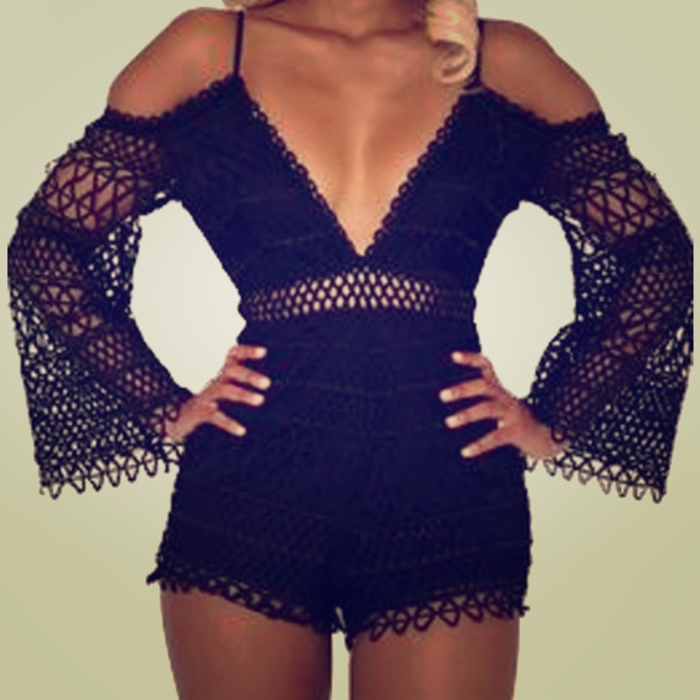 Black lace v neck romper never been worn *sold
